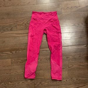 Hot pink Lululemon leggings with pockets